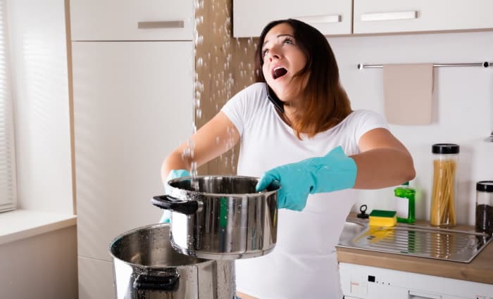 Woman with water damage / Ceiling leak / Pipe Break / Insurance Claim / Water Damage